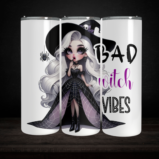One tumbler with a witch