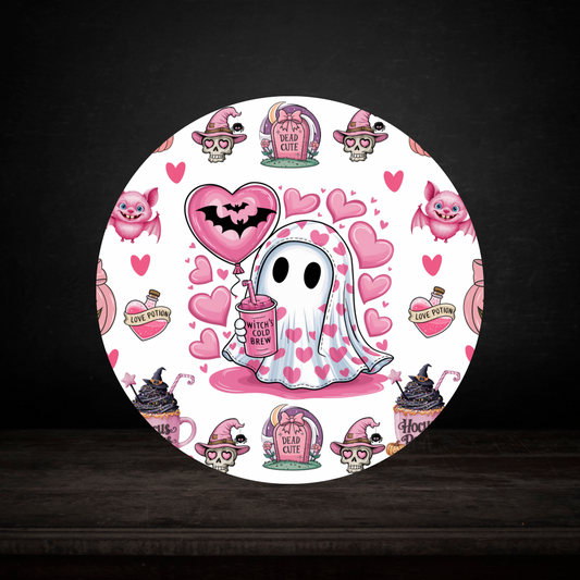 Round coaster with cartoon ghost, hearts, and potion bottles on a white background