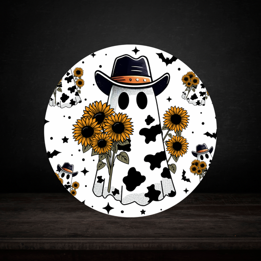 Round coaster with a ghost wearing a cowboy hat, surrounded by sunflowers on a dark background.